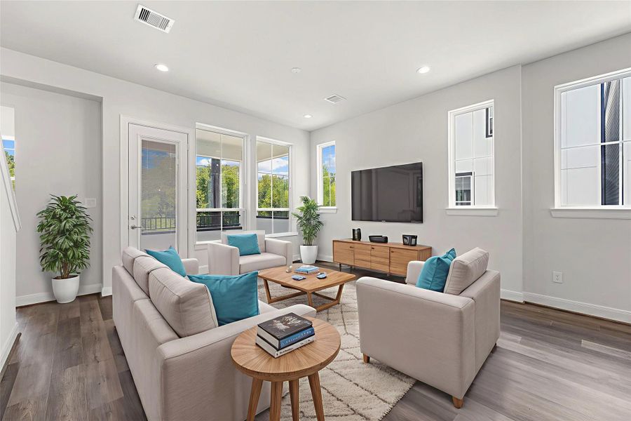 Furnished interior view inside a new home in The Corner At Buffalo Pointe, Houston (Image 12).