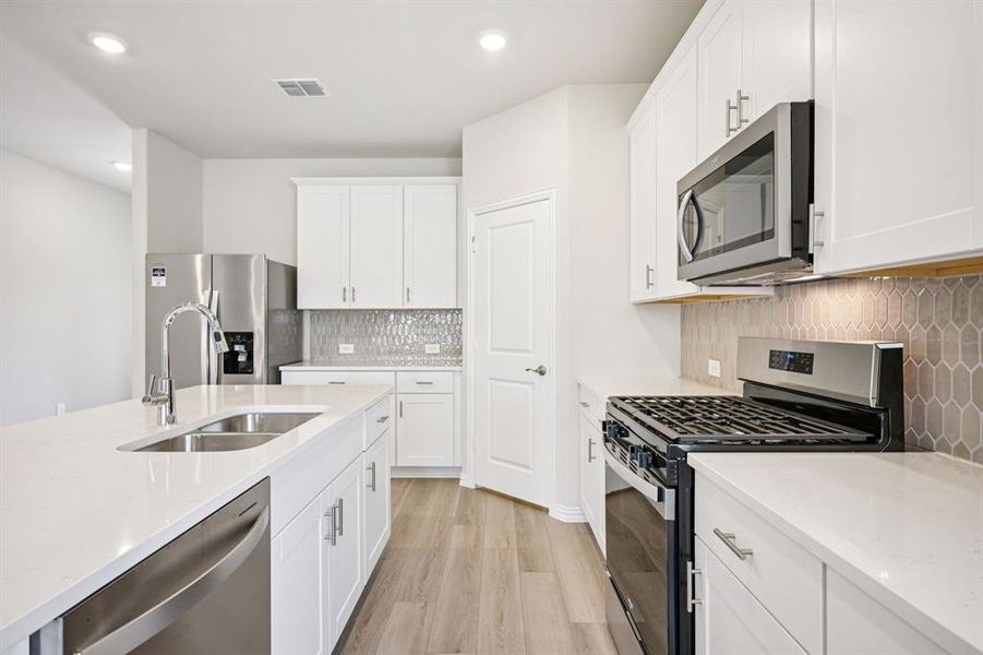 Photo is not of the actual home, but is an inspirational photo of builder’s model home and may depict options, furnishings, and/or decorator features that are not included.