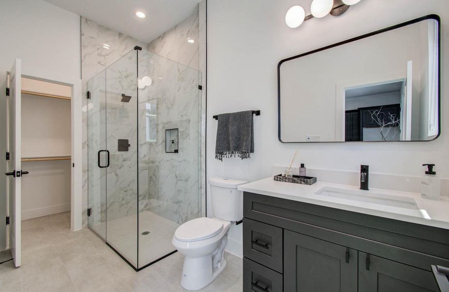 The studio apartment has an en-suite expansive bathroom with a walk-in closet The studio apartment has an en-suite expansive bathroom with a walk-in closet