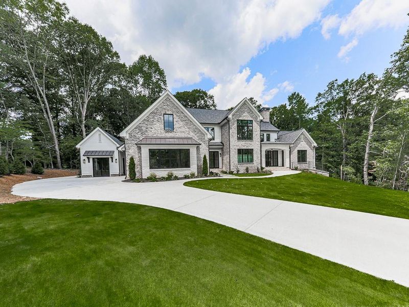 Front exterior of a new home in , Ball Ground, GA, highlighting curb appeal (Image 33).
