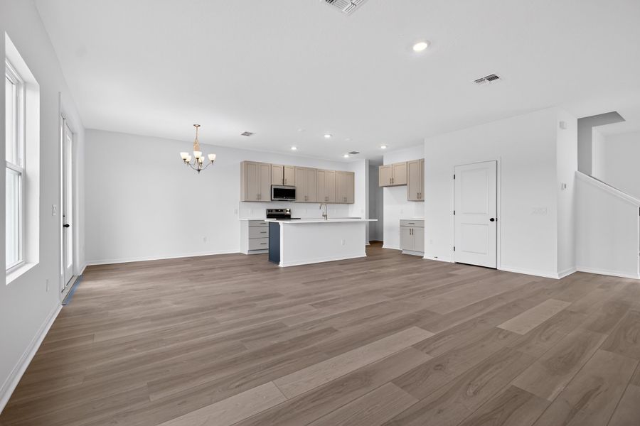 Representative unfurnished interior of a home built from the Sebago by Ashton Woods in Catamaran Cove, Rockledge (Image 8).
