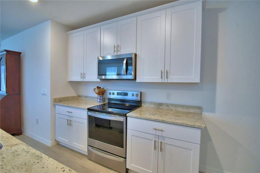 Furnished interior view inside a new home in Hammock Reserve - Signature Series, Haines City (Image 4). Furnished interior view inside a new home in Hammock Reserve - Signature Series, Haines City (Image 4).