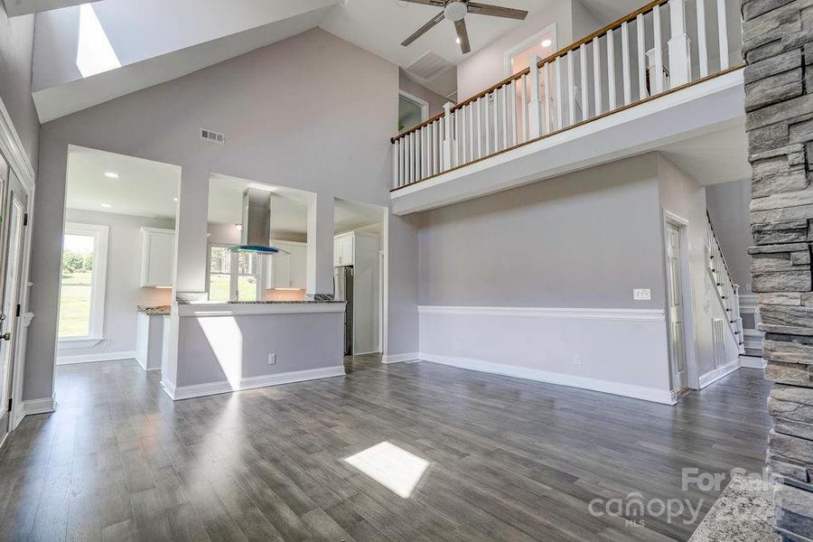 Breakfast bar between kitchen & living room