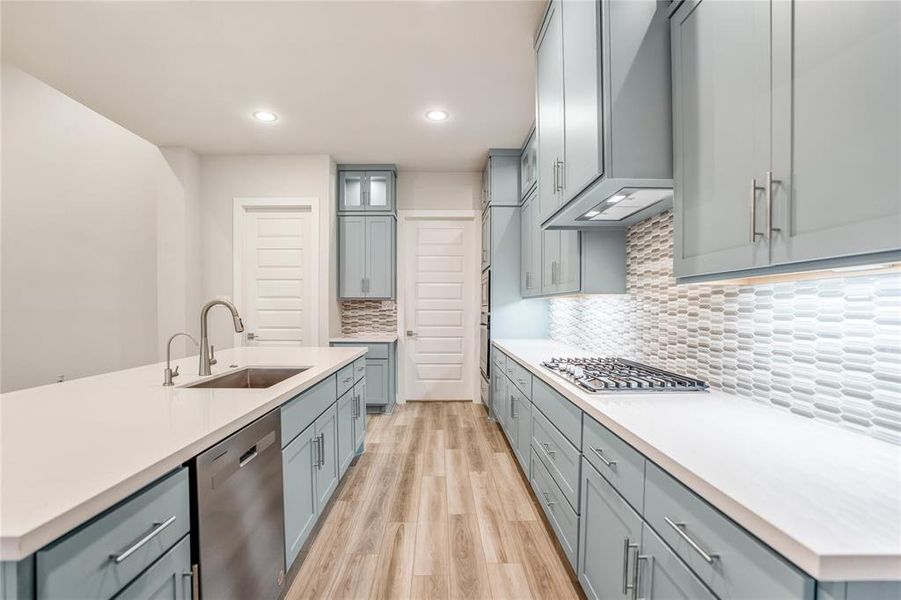 Under Cabinet Lighting and Pot & Pan Drawers Under the Cooktop