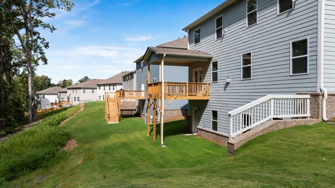 Front exterior of a new home in Butner Estates, South Fulton, GA, highlighting curb appeal (Image 6).