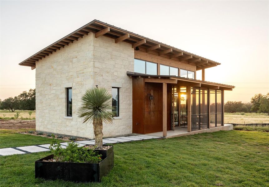 Front exterior of a new home in Hye Springs Ranch, Hye, TX, highlighting curb appeal (Image 23). Front exterior of a new home in Hye Springs Ranch, Hye, TX, highlighting curb appeal (Image 23).