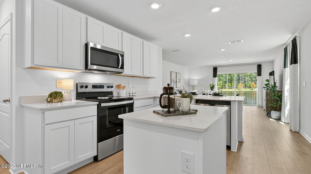 Furnished interior in a model home at Trout River in Jacksonville (Image 15).