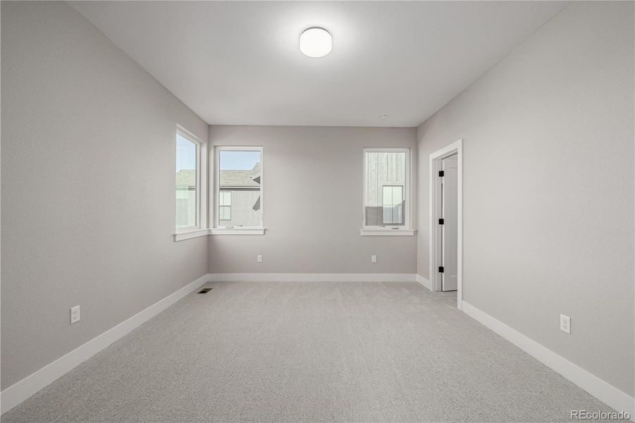 Spacious, unfurnished interior of a new home in West Grange, Longmont (Image 39).