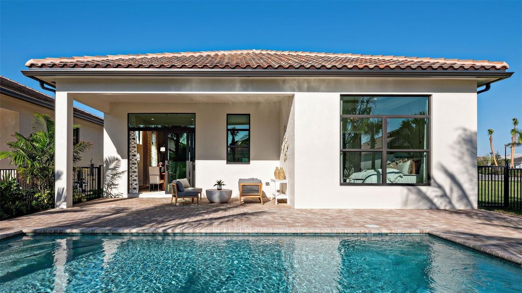 Exterior details and patio area of a home in Cresswind Palm Beach at Westlake, Westlake (Image 3).