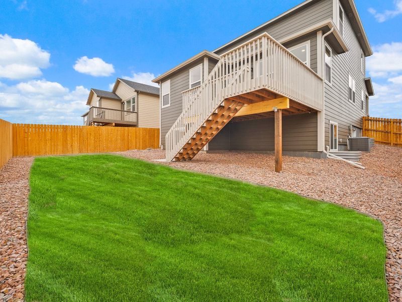 Exterior details and patio area of a home in Ridge at Lorson Ranch, Colorado Springs (Image 3).