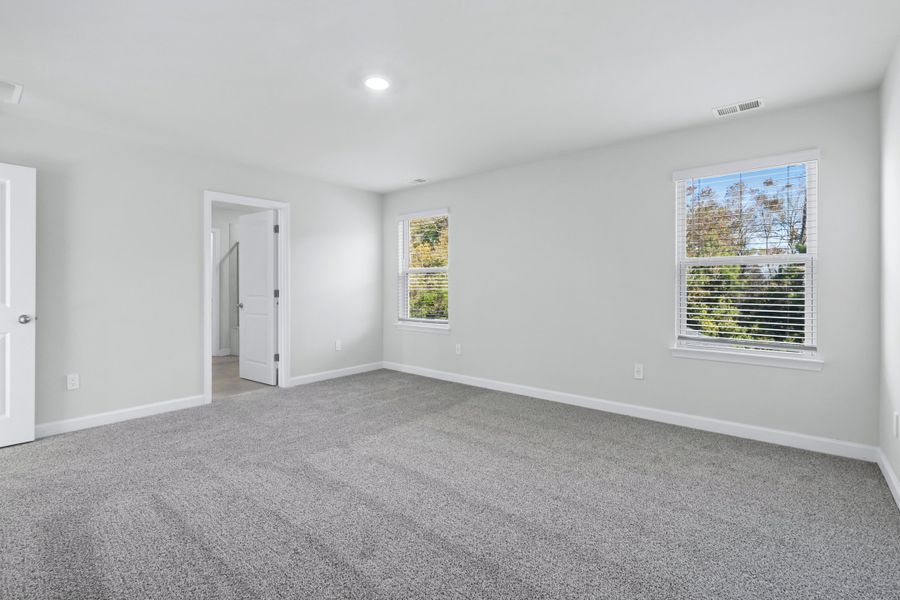 Spacious, unfurnished interior of a new home in Waterside - Coastline Series, Longs (Image 21).