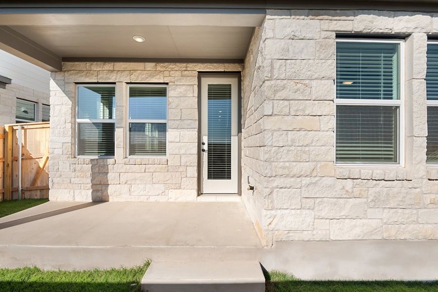 Exterior details and patio area of a home in Union Collection at Park Central, Georgetown (Image 27).