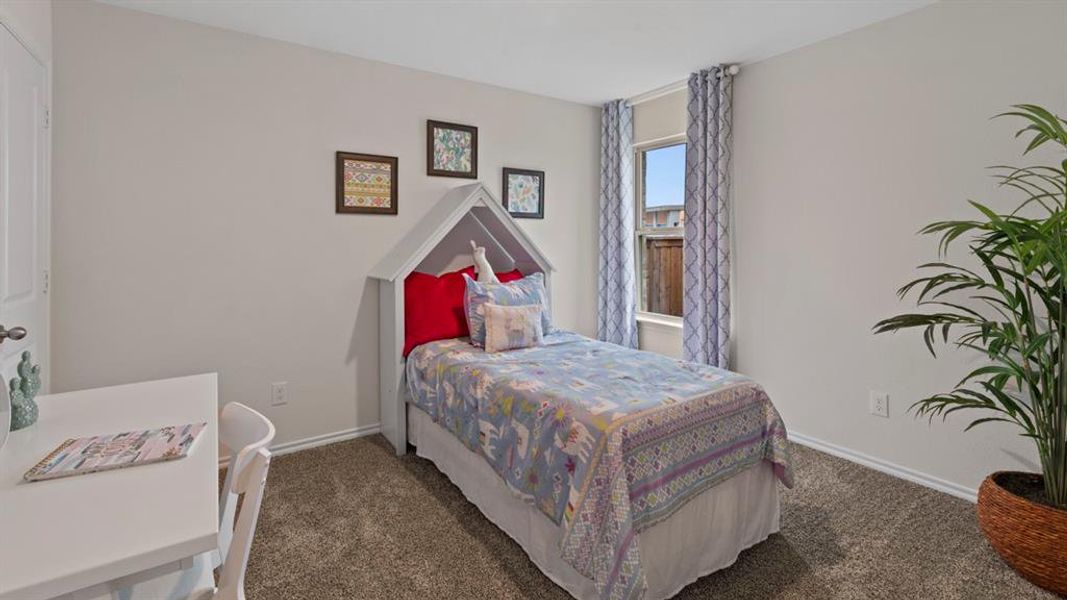 Bedroom with dark carpet