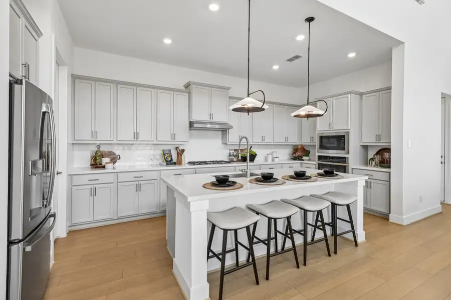 Representative furnished interior of a home built from the Sullivan by Taylor Morrison in Ryehill, Rosenberg (Image 4).