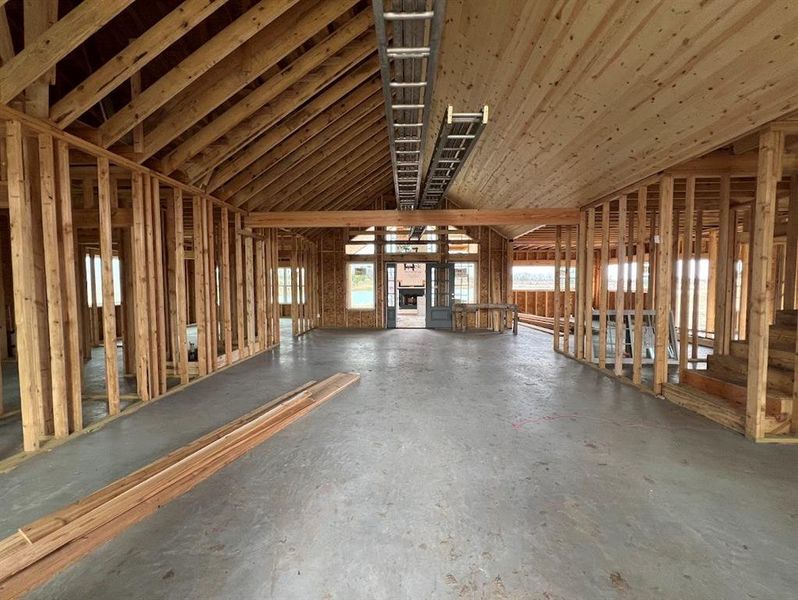 Vaulted ceilings will have explosed wood beams and open to the kitchen.  This house will have amazing views!
