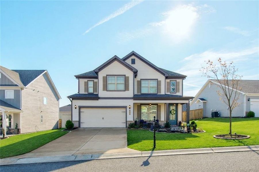 Front exterior of a new home in , Homer, GA, highlighting curb appeal (Image 26).