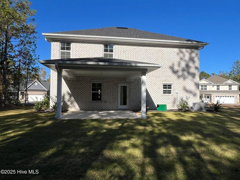 Exterior details and patio area of a home in Palmetto Creek, Bolivia (Image 17).
