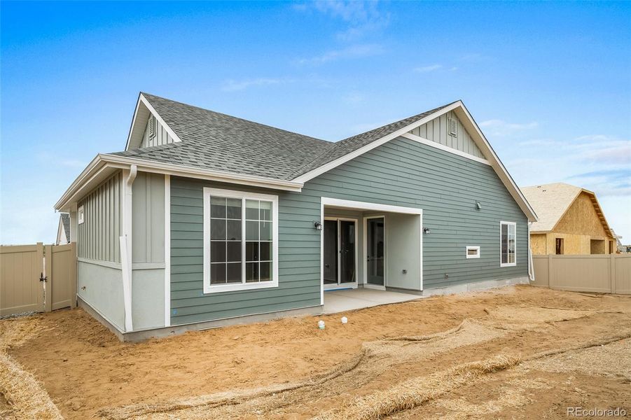 Front exterior of a new home in The Reserve, Aurora, CO, highlighting curb appeal (Image 2).