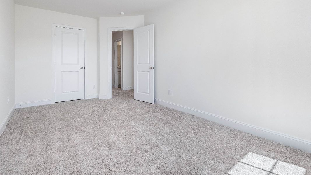 Furnished interior view inside a new home in Sidney Creek Townhomes, Zebulon (Image 19).