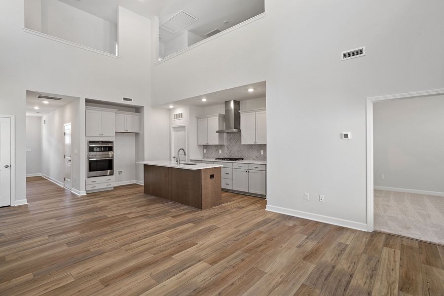 Furnished interior view inside a new home in Ovation at Sweetbrier, Durham (Image 12).