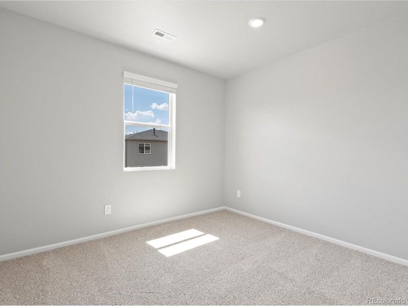 Spacious, unfurnished interior of a new home in Poudre Heights: The Alpine Collection, Windsor (Image 33).