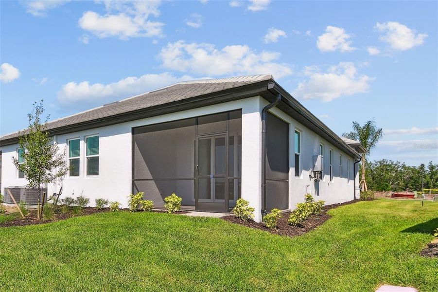 Exterior details and patio area of a home in Sweetwater at Lakewood Ranch, Lakewood Ranch (Image 4).