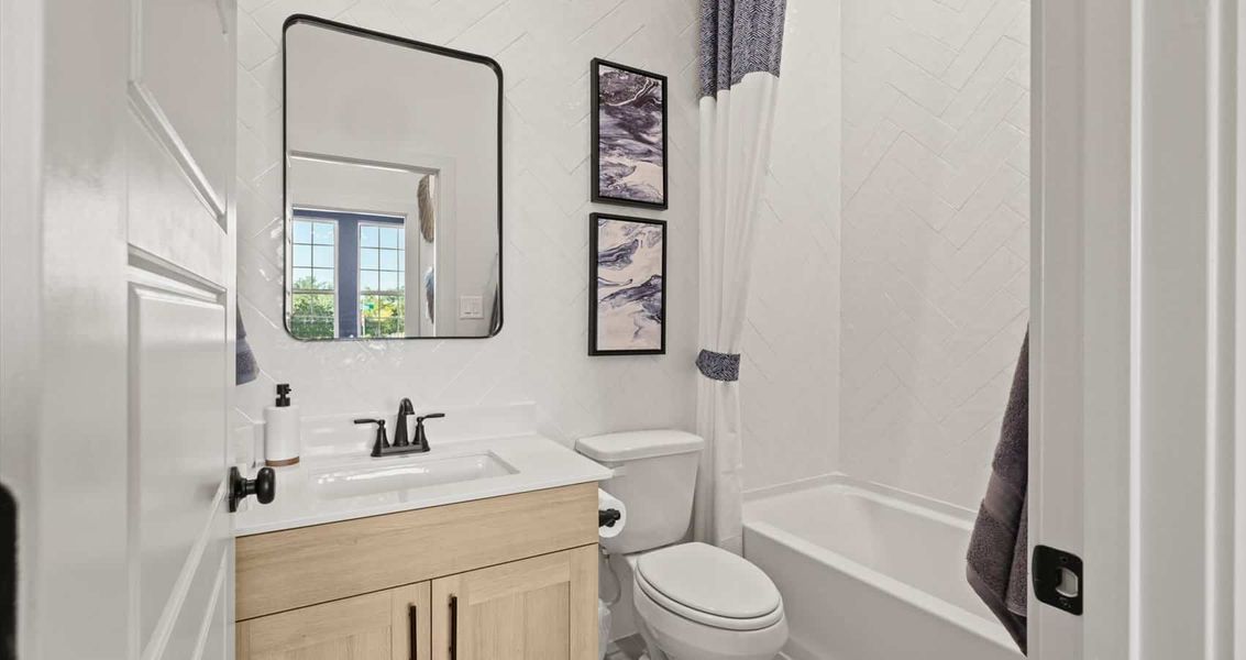 Furnished interior view inside a new home in Stream Waters, Seguin (Image 17).