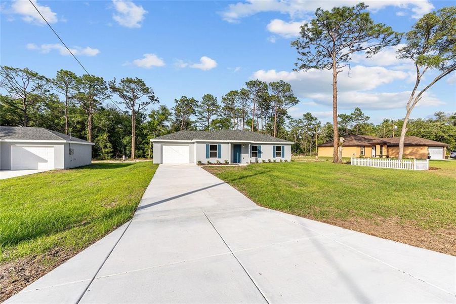 Front exterior of a new home in , Ocala, FL, highlighting curb appeal (Image 16).