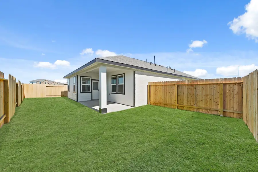 Peaceful backyard with covered patio
