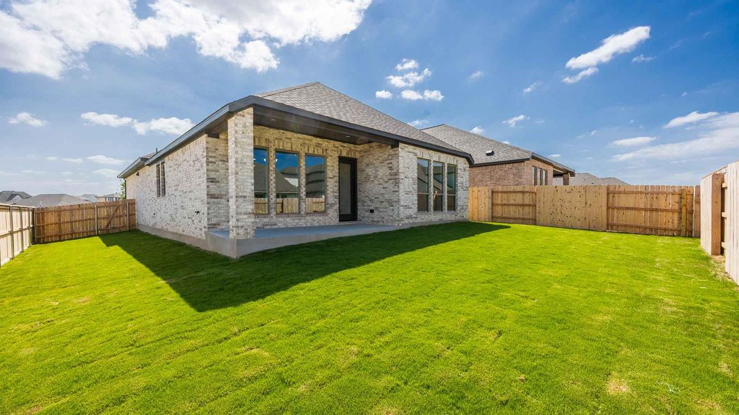 Exterior details and patio area of a home in Lariat 45', Liberty Hill (Image 3). Exterior details and patio area of a home in Lariat 45', Liberty Hill (Image 3).