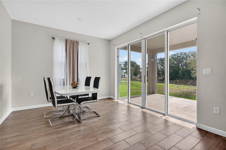 Furnished interior view inside a new home in Seasons at Forest Creek, Haines City (Image 6).