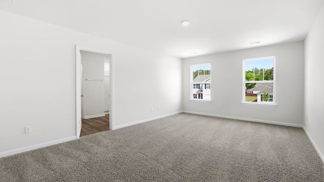 Spacious, unfurnished interior of a new home in Bentley Park, Greenwood (Image 32).