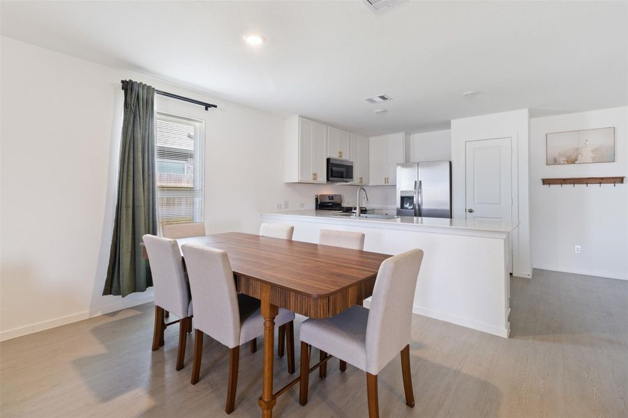 Furnished interior view inside a new home in Samara, League City (Image 5).