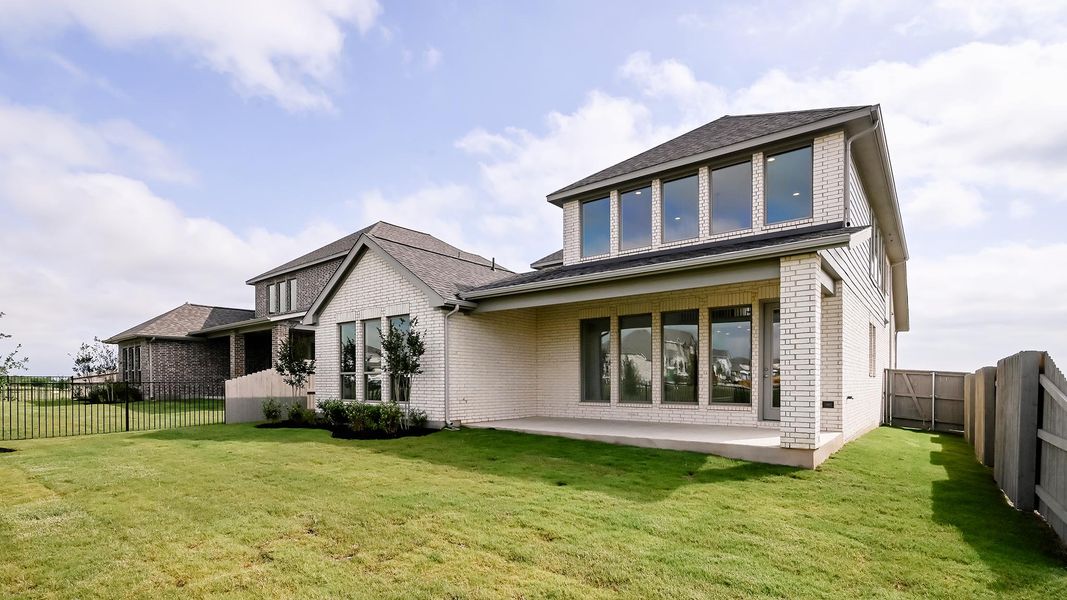 Exterior details and patio area of a home in Flora 50', Hutto (Image 22).