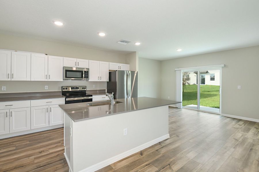 Furnished interior view inside a new home in Scenic Terrace, Haines City (Image 3).