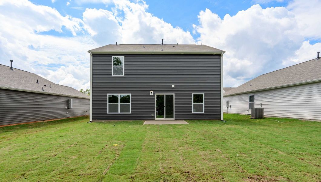 Front exterior of a new home in Treemont Commons, Wellford, SC, highlighting curb appeal (Image 2).