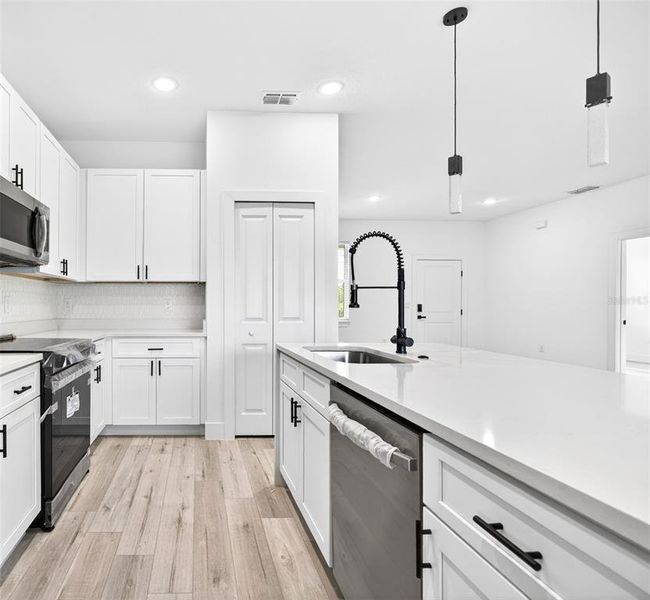 Furnished interior view inside a new home in , Port Charlotte (Image 10).