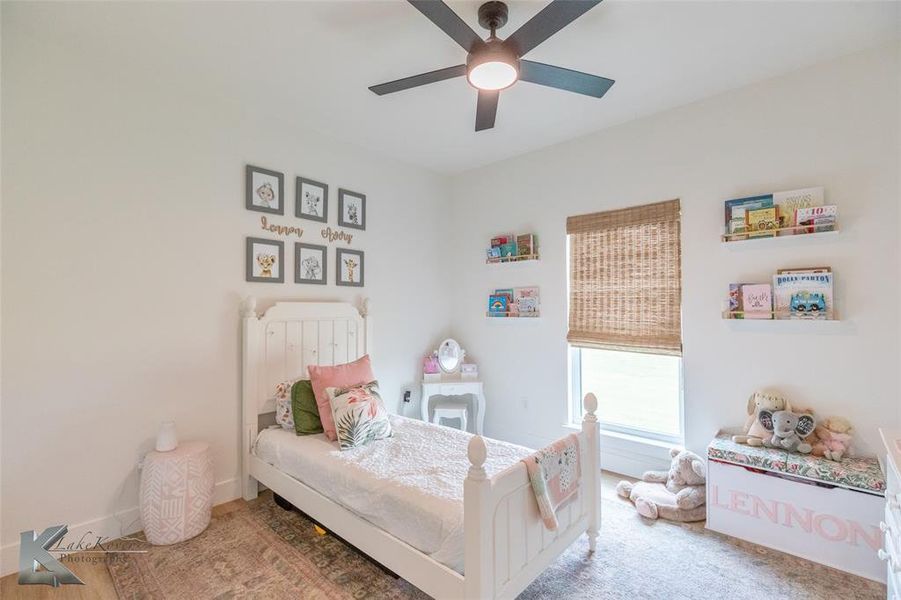 Bedroom with a ceiling fan Bedroom with a ceiling fan