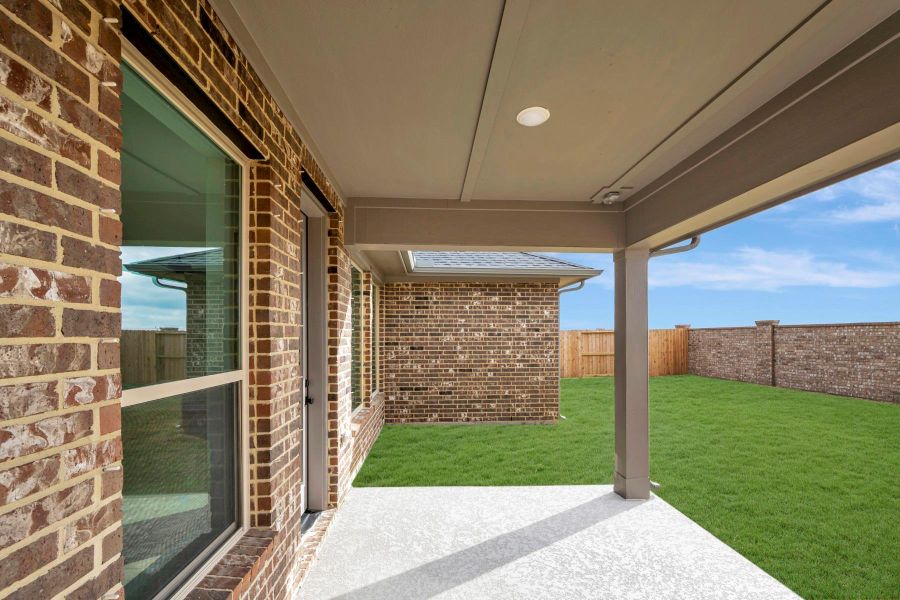 Exterior details and patio area of a home in Beacon Point at Lago Mar 50’ Homesites, Texas City (Image 2).