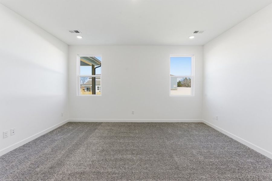 A room with a few windows.