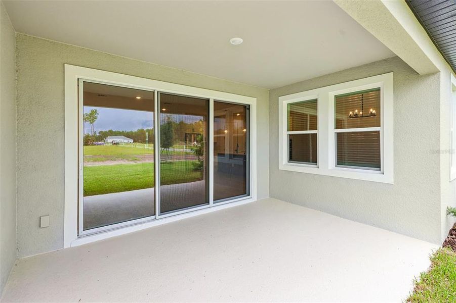 Exterior details and patio area of a home in , Ormond Beach (Image 3).