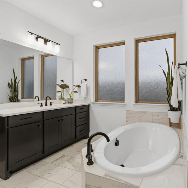 Furnished interior view inside a new home in Wolf Ranch, Georgetown (Image 17).