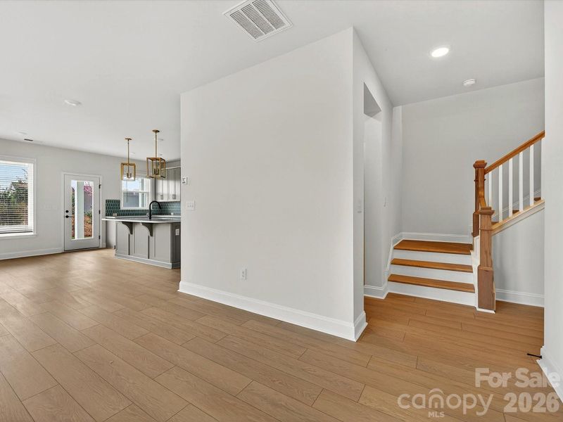 LVP flooring throught the main floor with compostie LVP stair treads