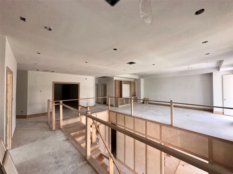View of upstairs gallery - 4 bedrooms, laundry room, media room and family room all off this unique gallery with a view of the foyer below View of upstairs gallery - 4 bedrooms, laundry room, media room and family room all off this unique gallery with a view of the foyer below