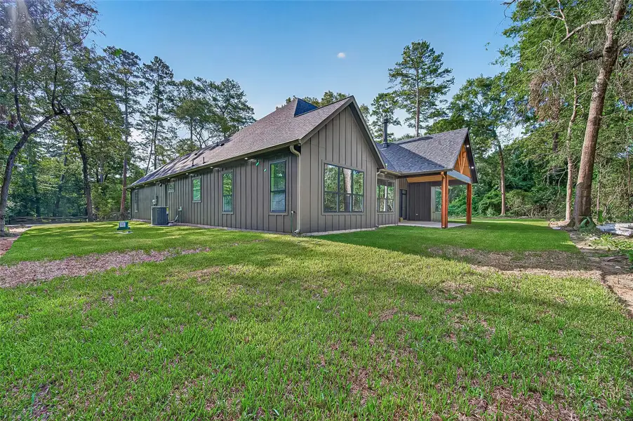 Exterior details and patio area of a home in , Plantersville (Image 33).