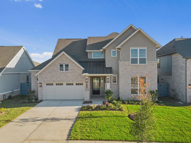 Representative exterior photo of a completed home built from the Rivercrest by Chesmar Homes in Fulshear Lakes, Fulshear, TX (Image 31).