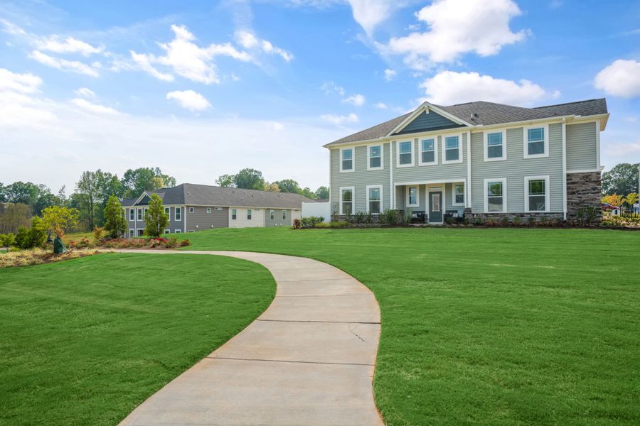 Representative exterior photo of a completed home built from the Clifton by Mattamy Homes in Magnolia Park Townes, Garner, NC (Image 20).