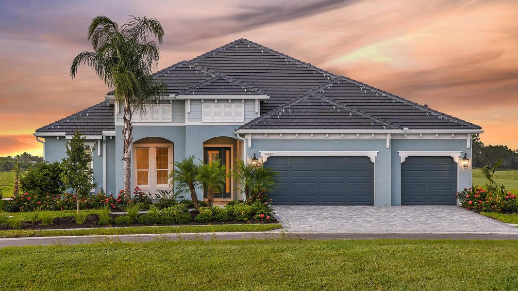 Representative exterior photo of a completed home built from the Kiawah 2 by Neal Communities in Grand Park, Sarasota, FL (Image 14).