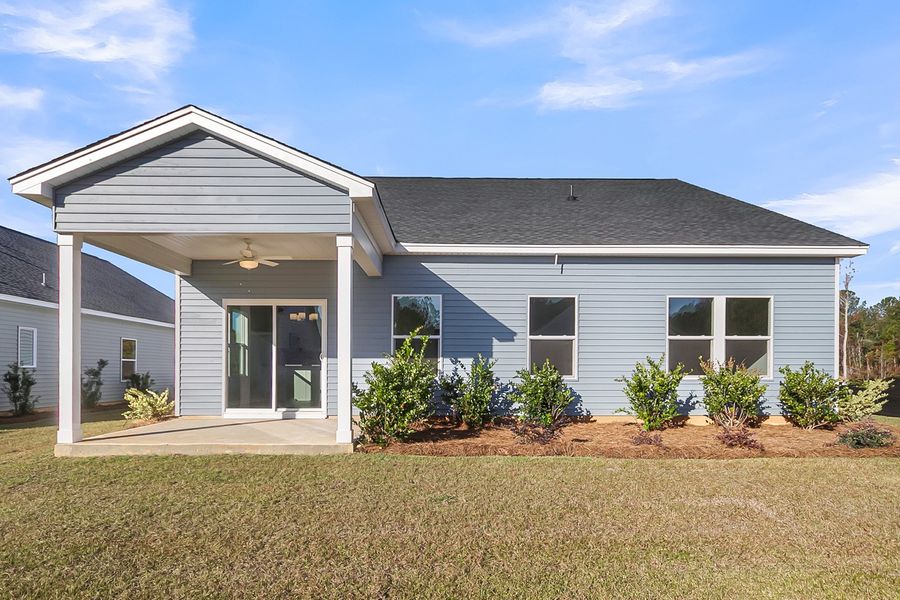 Exterior details and patio area of a home in Fairway Woods at Wyboo, Manning (Image 18).