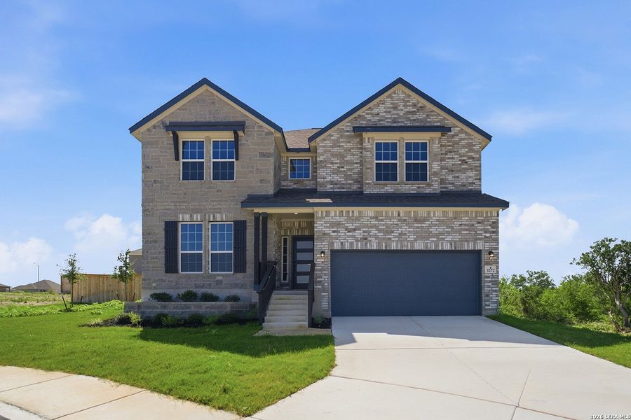 Front exterior of a new home in Arcadia Ridge, San Antonio, TX, highlighting curb appeal (Image 2).